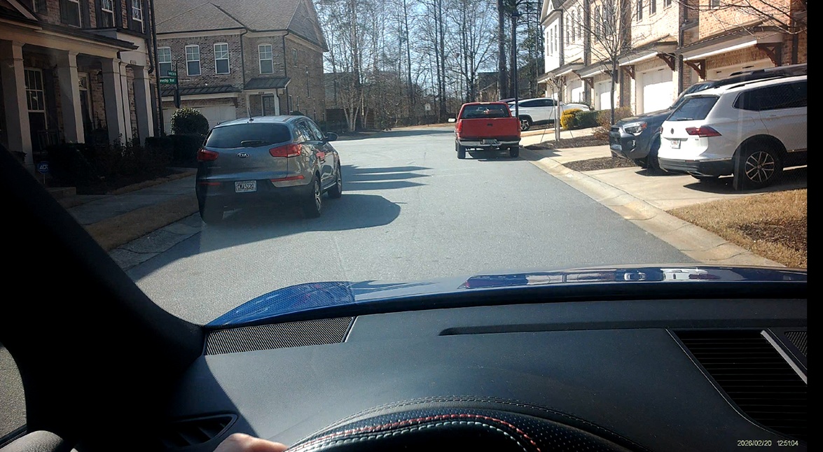 Cars on both sides of street - cannot pass